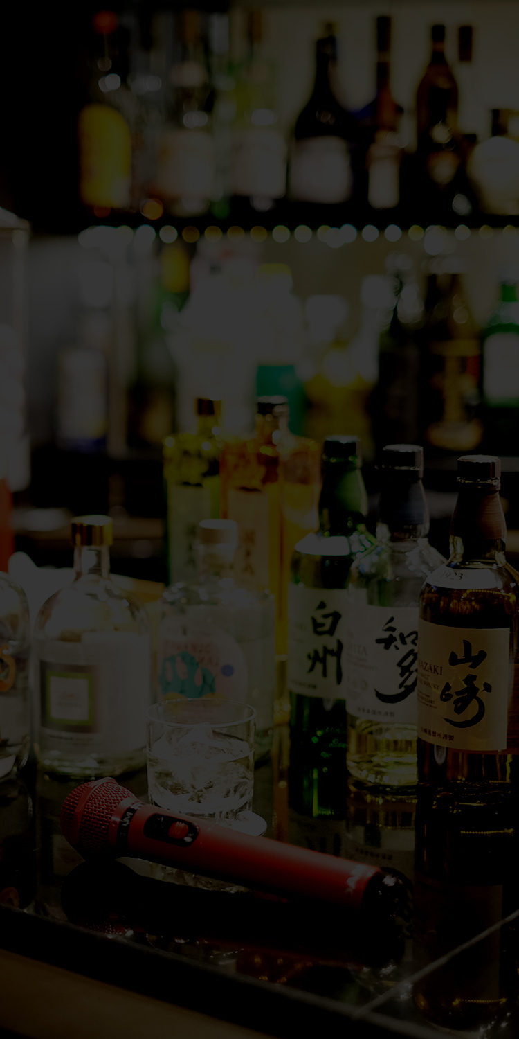 Bottles and drinks available at the NearMe Karaoke Bar counter